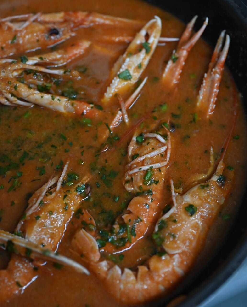 Scampi in buzara sauce in The Well Restaurant Zadar